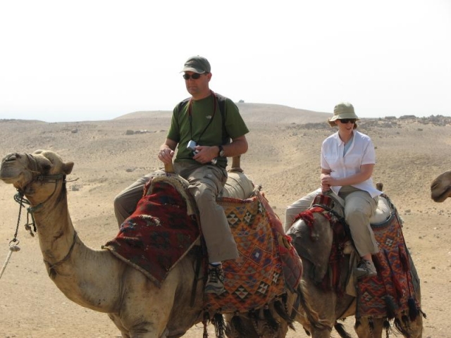 Riding camels in Egypt