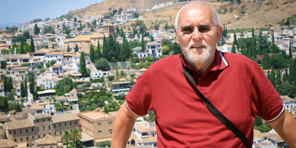 MAN AT THE ALHAMBRA IN CORDOBA, SPAIN